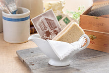 Load image into Gallery viewer, Playa Del Mar- QMC ironstone gravy boat w/vintage postcard and shoe brush