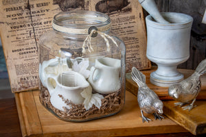 vintage jar with 4 ironstone creamers and fall touches