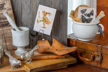 Load image into Gallery viewer, ironstone chamber pot vignette with wooden board, paint brushes, and butterfly illustration
